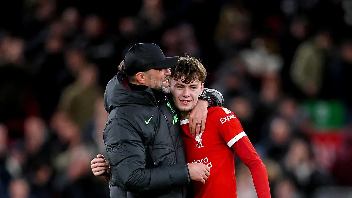 Liverpool v Fulham - Carabao Cup - Semi Final - First Leg - Anfield Liverpool manager Jurgen Klopp left hugs Conor Bradley at the end of the Carabao Cup semi final first leg match at Anfield, Liverpool. Picture date: Wednesday January 10, 2024. EDITORIAL USE ONLY No use with unauthorised audio, video, data, fixture lists, club/league logos or live services. Online in-match use limited to 120 images, no video emulation. No use in betting, games or single club/league/player publications. PUBLICATIONxNOTxINxUKxIRL Copyright: xPeterxByrnex 75031985
