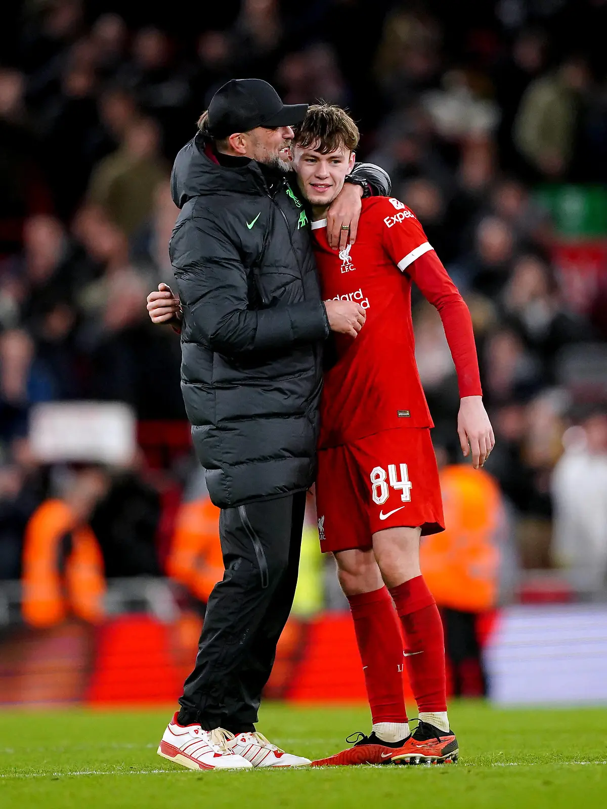 Liverpool v Fulham - Carabao Cup - Semi Final - First Leg - Anfield Liverpool manager Jurgen Klopp left hugs Conor Bradley at the end of the Carabao Cup semi final first leg match at Anfield, Liverpool. Picture date: Wednesday January 10, 2024. EDITORIAL USE ONLY No use with unauthorised audio, video, data, fixture lists, club/league logos or live services. Online in-match use limited to 120 images, no video emulation. No use in betting, games or single club/league/player publications. PUBLICATIONxNOTxINxUKxIRL Copyright: xPeterxByrnex 75031985