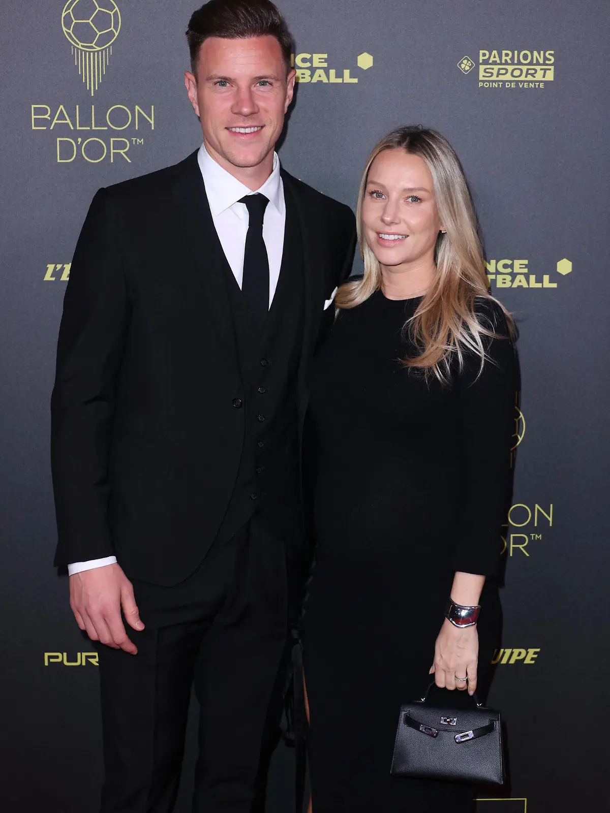 Marc-Andre Ter Stegen and Daniela Jehle arrives at the Ballon d Or 2023 Ceremony at the Chatelet theater, on October 30, 2023 in Paris, France. Photo by Jerome DominÃ©/ABACAPRESS.COM