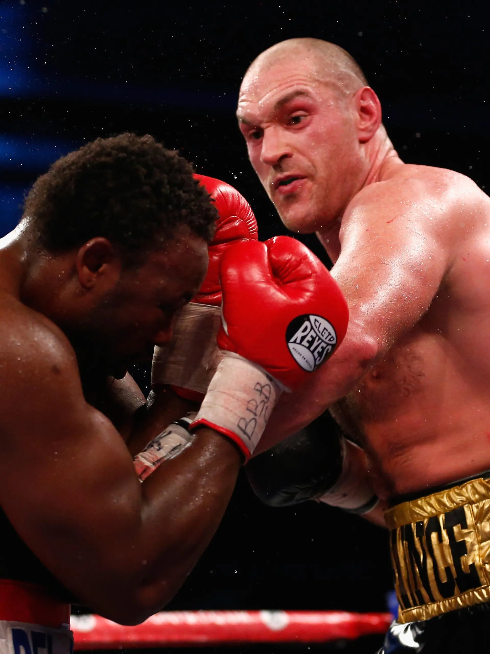 LONDON, ENGLAND - NOVEMBER 29:  Dereck Chisora of England fights Tyson Fury of England in the eliminator for the WBO World Heavyweight Championship during Boxing at ExCel on November 29, 2014 in London, England.  (Photo by Julian Finney/Getty Images)