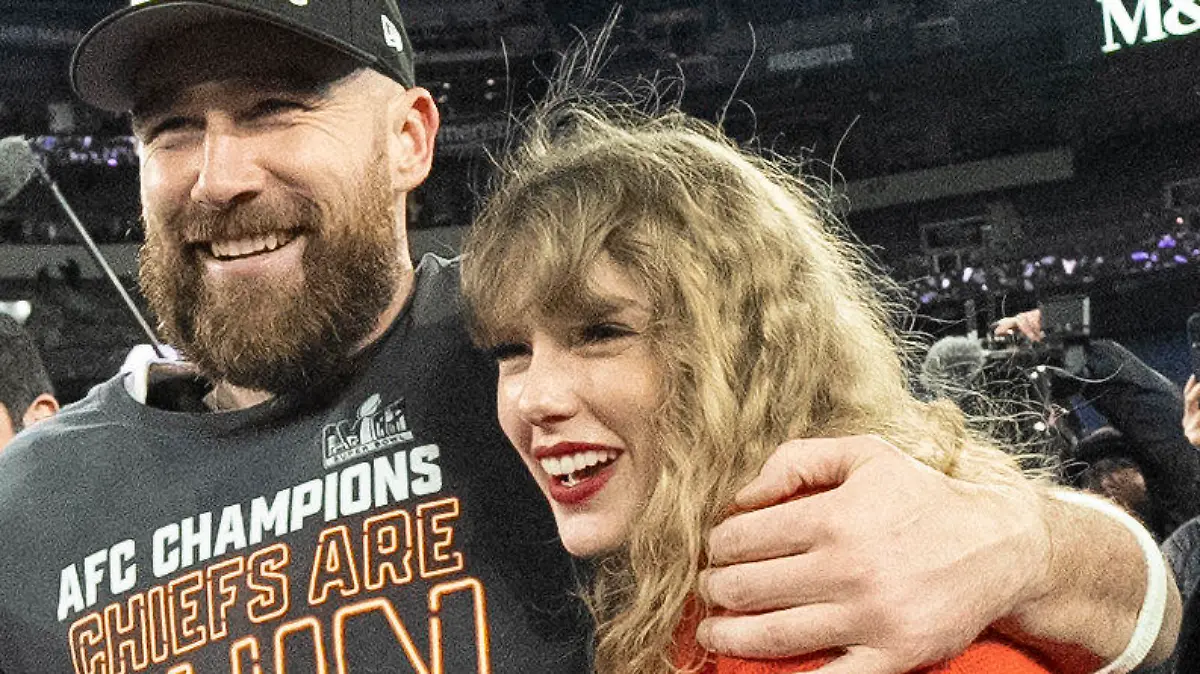 FILE - Kansas City Chiefs tight end Travis Kelce and Taylor Swift walk together after an AFC Championship NFL football game between the Chiefs and the Baltimore Ravens, Jan. 28, 2024, in Baltimore.. Taylor Swift, who is holding concerts in Japan, will make it in time for the Super Bowl to see her partner and football superstar Travis Kelce play. (AP Photo/Julio Cortez, File)