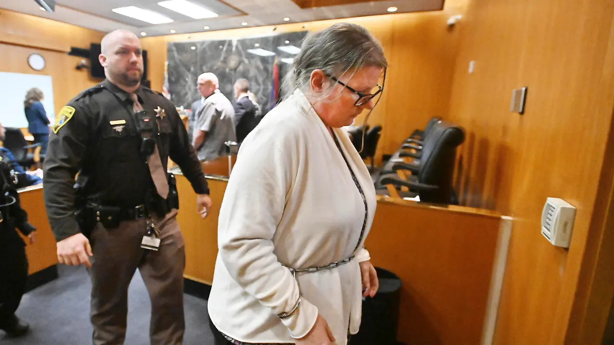 Defendant Jennifer Crumbley exits the courtroom after the jury's unanimous verdict of guilty of involuntary manslaughter on all counts at the conclusion of her trial in the courtroom of Judge Cheryl Matthews at Oakland County Circuit Court in Pontiac, Mich., on Tuesday, Feb. 6, 2024.  (Daniel Mears/Detroit News via AP)