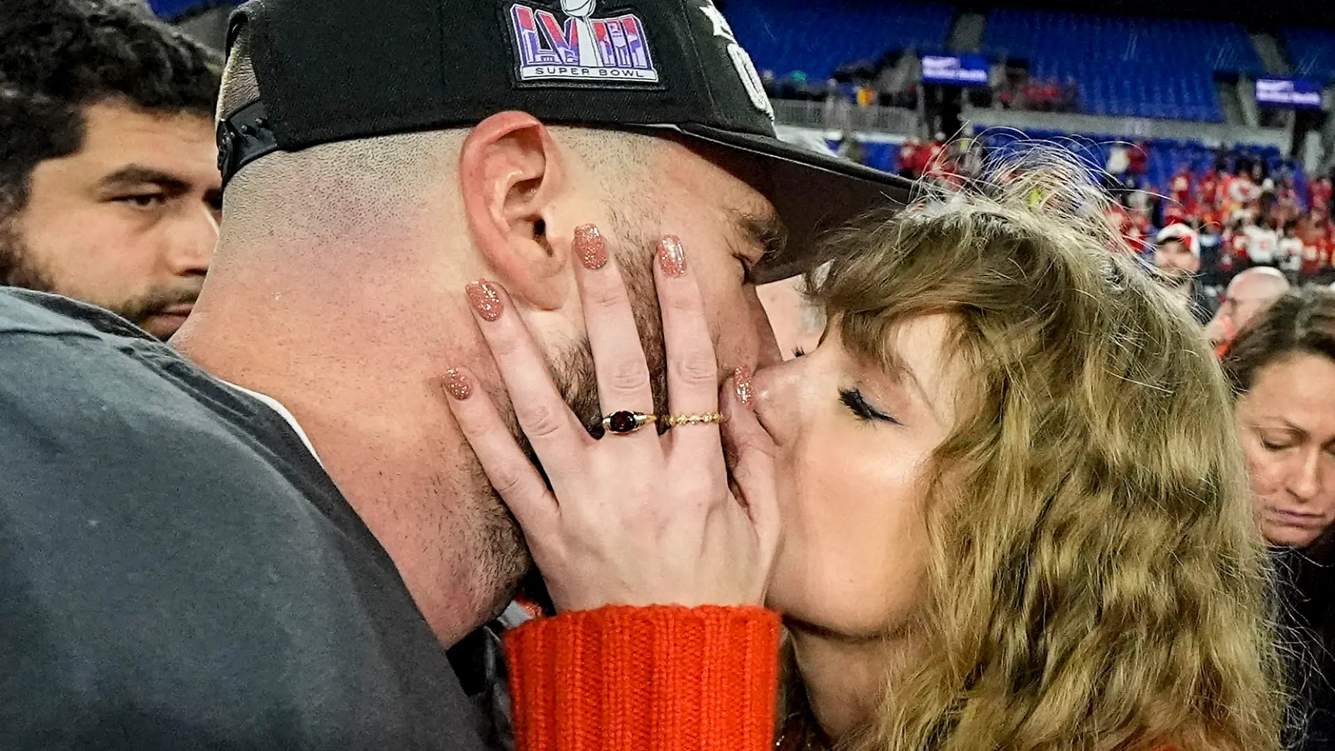 Taylor Swift kisses Kansas City Chiefs tight end Travis Kelce after an AFC Championship NFL football game against the Baltimore Ravens, Sunday, Jan. 28, 2024, in Baltimore. The Kansas City Chiefs won 17-10. (AP Photo/Julio Cortez)