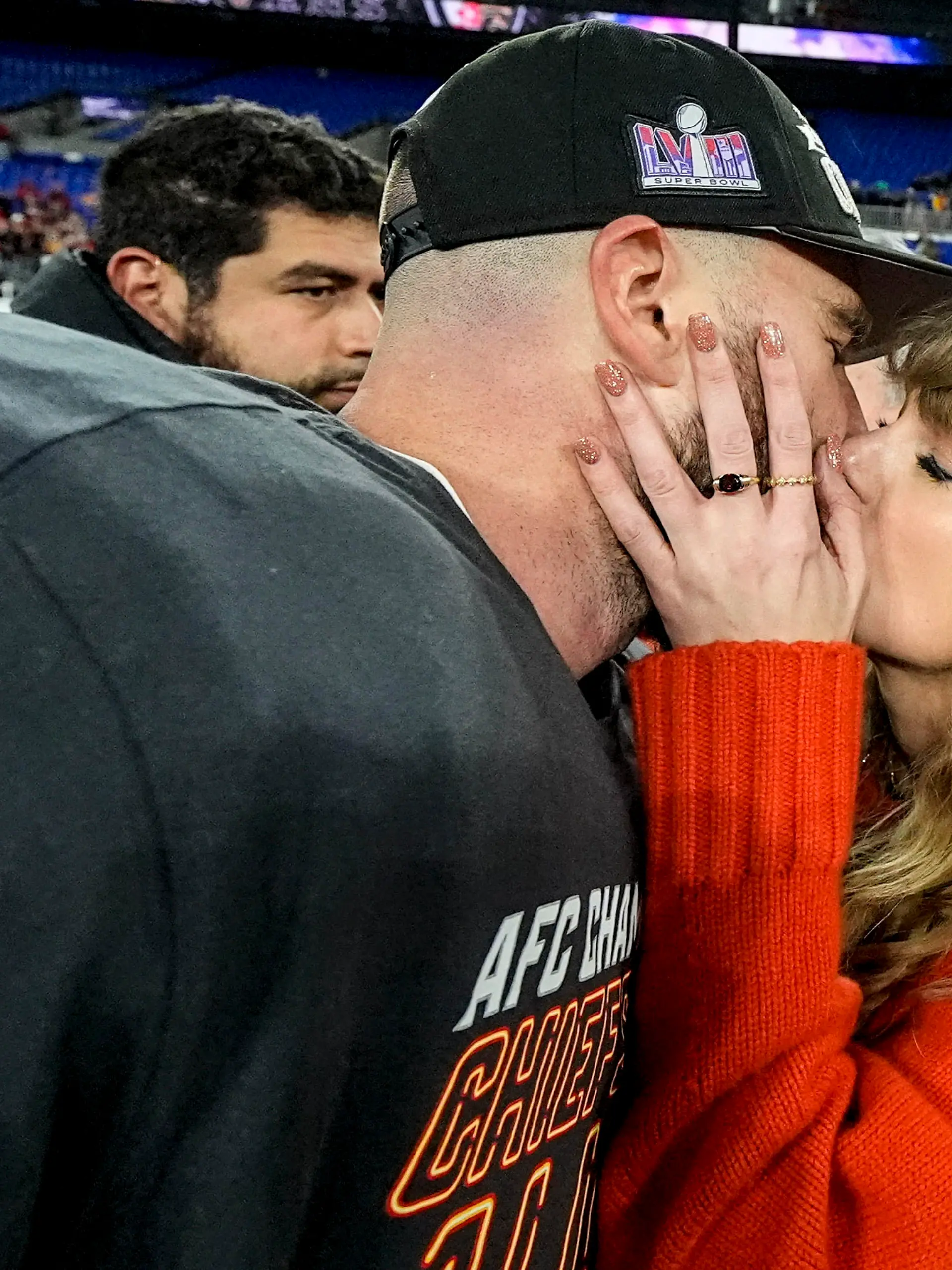 Taylor Swift kisses Kansas City Chiefs tight end Travis Kelce after an AFC Championship NFL football game against the Baltimore Ravens, Sunday, Jan. 28, 2024, in Baltimore. The Kansas City Chiefs won 17-10. (AP Photo/Julio Cortez)