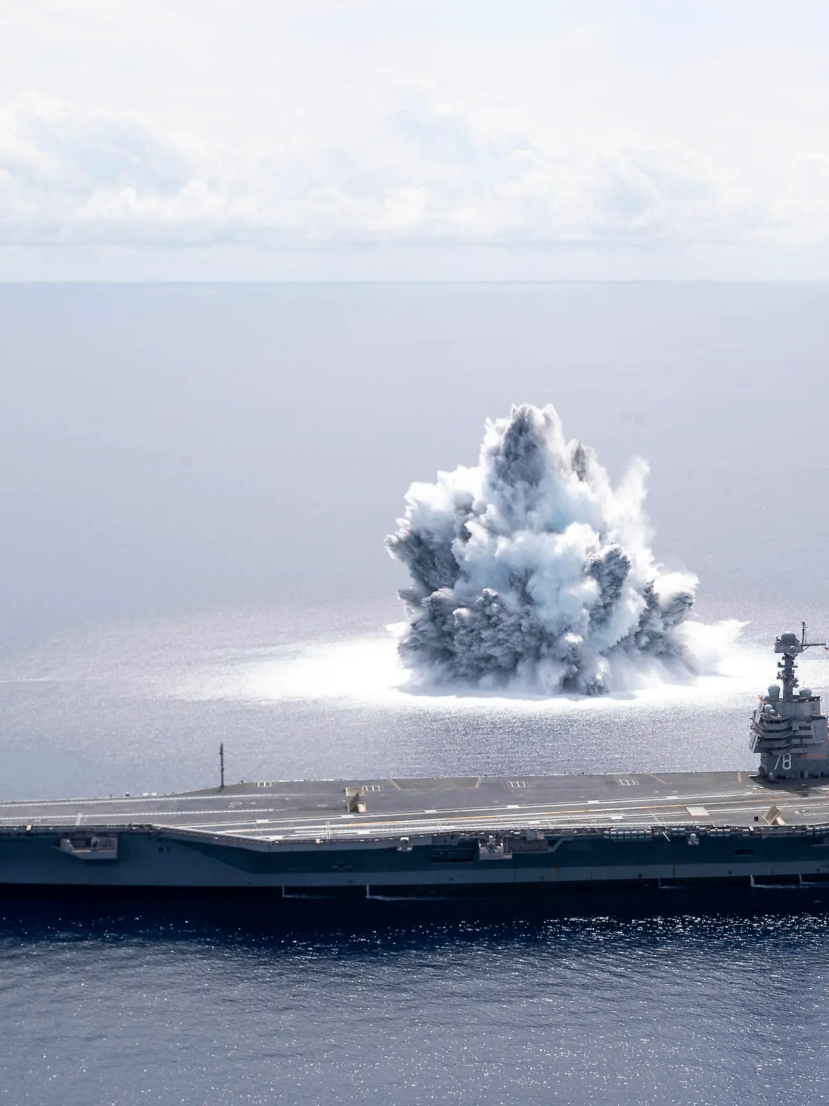 Handout photo of the aircraft carrier USS Gerald R. Ford (CVN 78) completes the first scheduled explosive event of Full Ship Shock Trials while underway in the Atlantic Ocean, June 18, 2021. The U.S. Navy conducts shock trials of new ship designs using live explosives to confirm that our warships can continue to meet demanding mission requirements under harsh conditions they might encounter in battle. U.S. Navy photo by Mass Communication Specialist 3rd Class Riley B. McDowell via ABACAPRESS.COM
