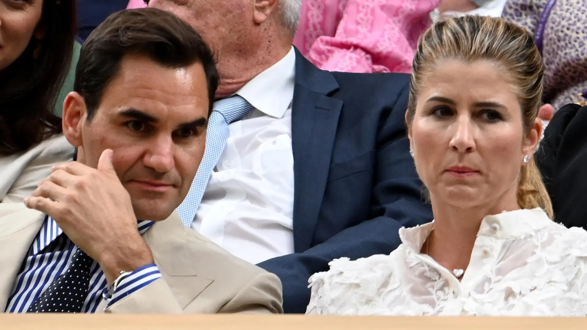 LONDON, ENGLAND - JULY 04: Former Wimbledon Champion, Roger Federer of Switzerland and his wife Mirka Federer react from the Royal Box following the Men's Singles first round match between Andy Murray of Great Britain and Ryan Peniston of Great Britain during day two of The Championships Wimbledon 2023 at All England Lawn Tennis and Croquet Club on July 04, 2023 in London, England. Stringer / Anadolu Agency
