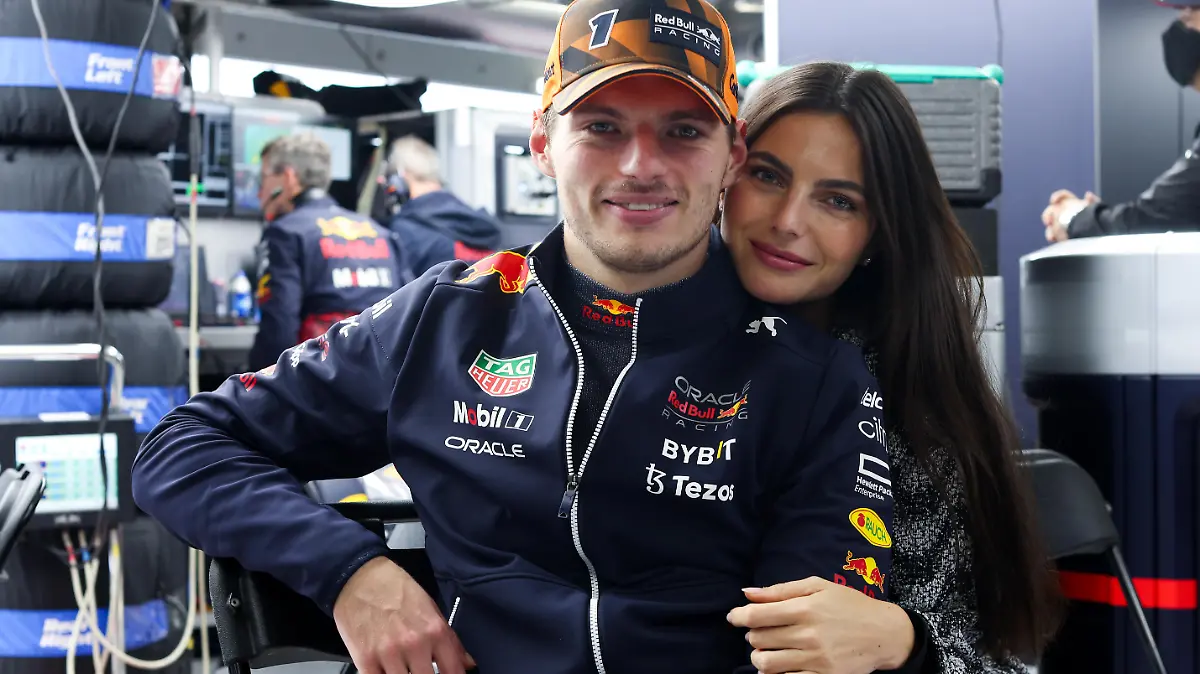 SUZUKA, JAPAN - OCTOBER 09: Max Verstappen of the Netherlands and Oracle Red Bull Racing and Kelly Piquet pose for a photo during a red flag delay during the F1 Grand Prix of Japan at Suzuka International Racing Course on October 09, 2022 in Suzuka, Japan. (Photo by Peter Fox/Getty Images)