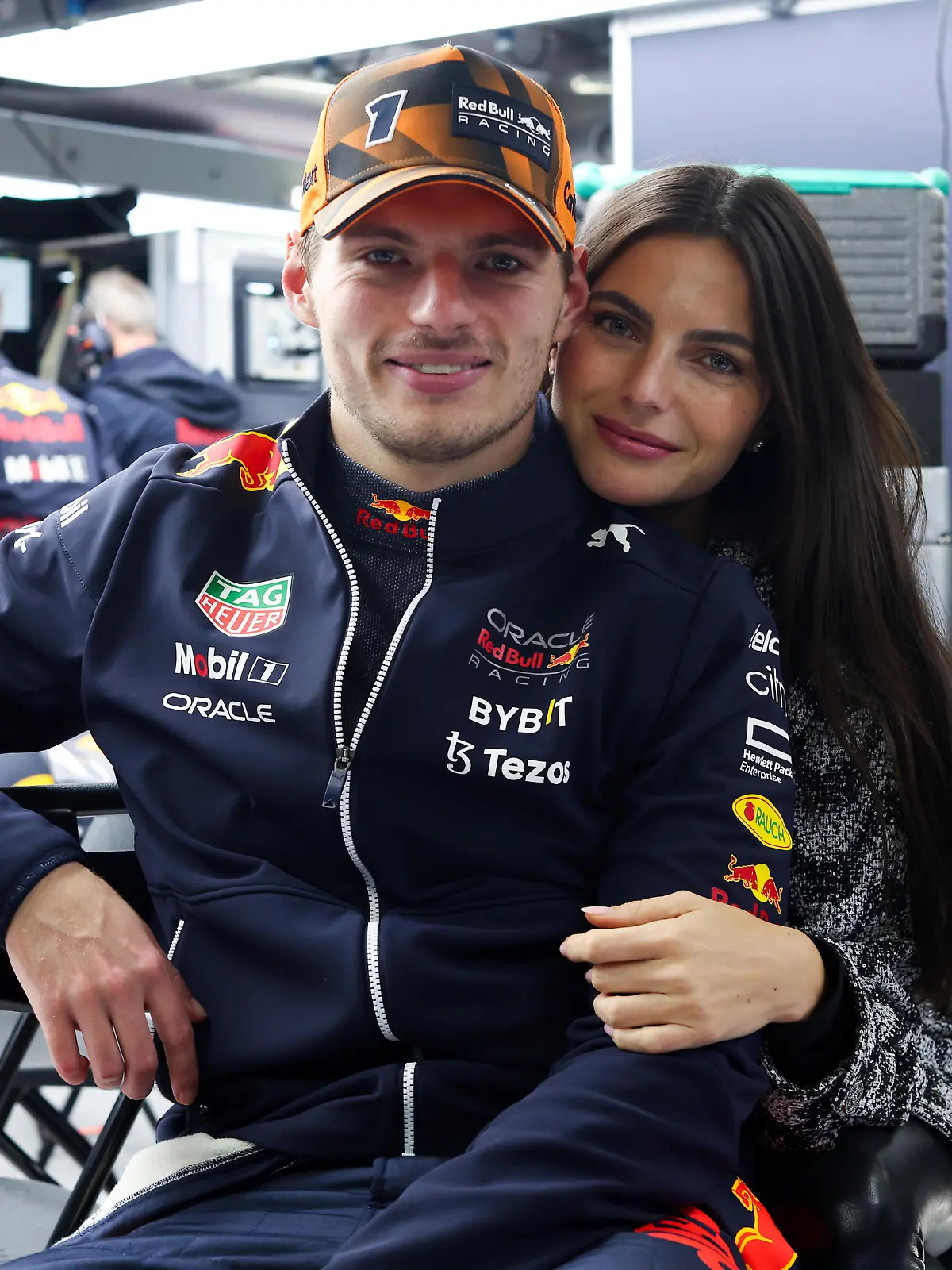 SUZUKA, JAPAN - OCTOBER 09: Max Verstappen of the Netherlands and Oracle Red Bull Racing and Kelly Piquet pose for a photo during a red flag delay during the F1 Grand Prix of Japan at Suzuka International Racing Course on October 09, 2022 in Suzuka, Japan. (Photo by Peter Fox/Getty Images)
