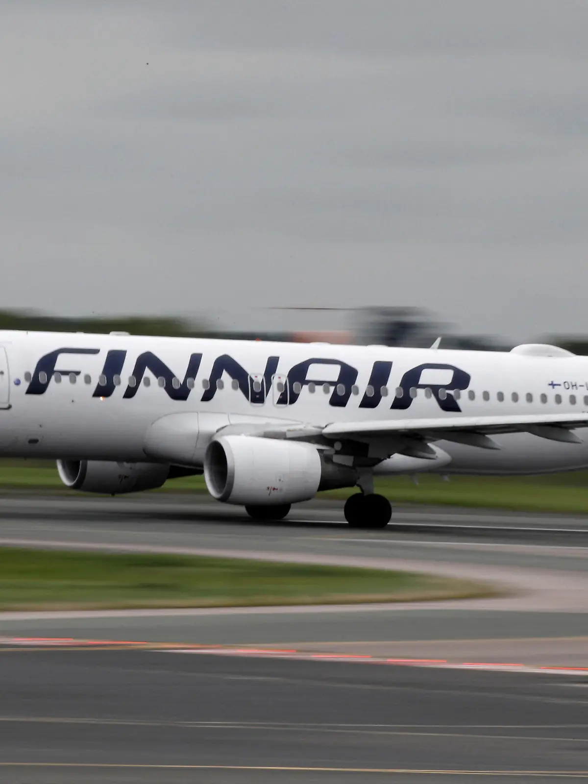 FILE PHOTO: A Finnair Airbus A320-200 aircraft prepares to take off from Manchester Airport in Manchester, Britain September 4, 2018. REUTERS/Phil Noble/File Photo