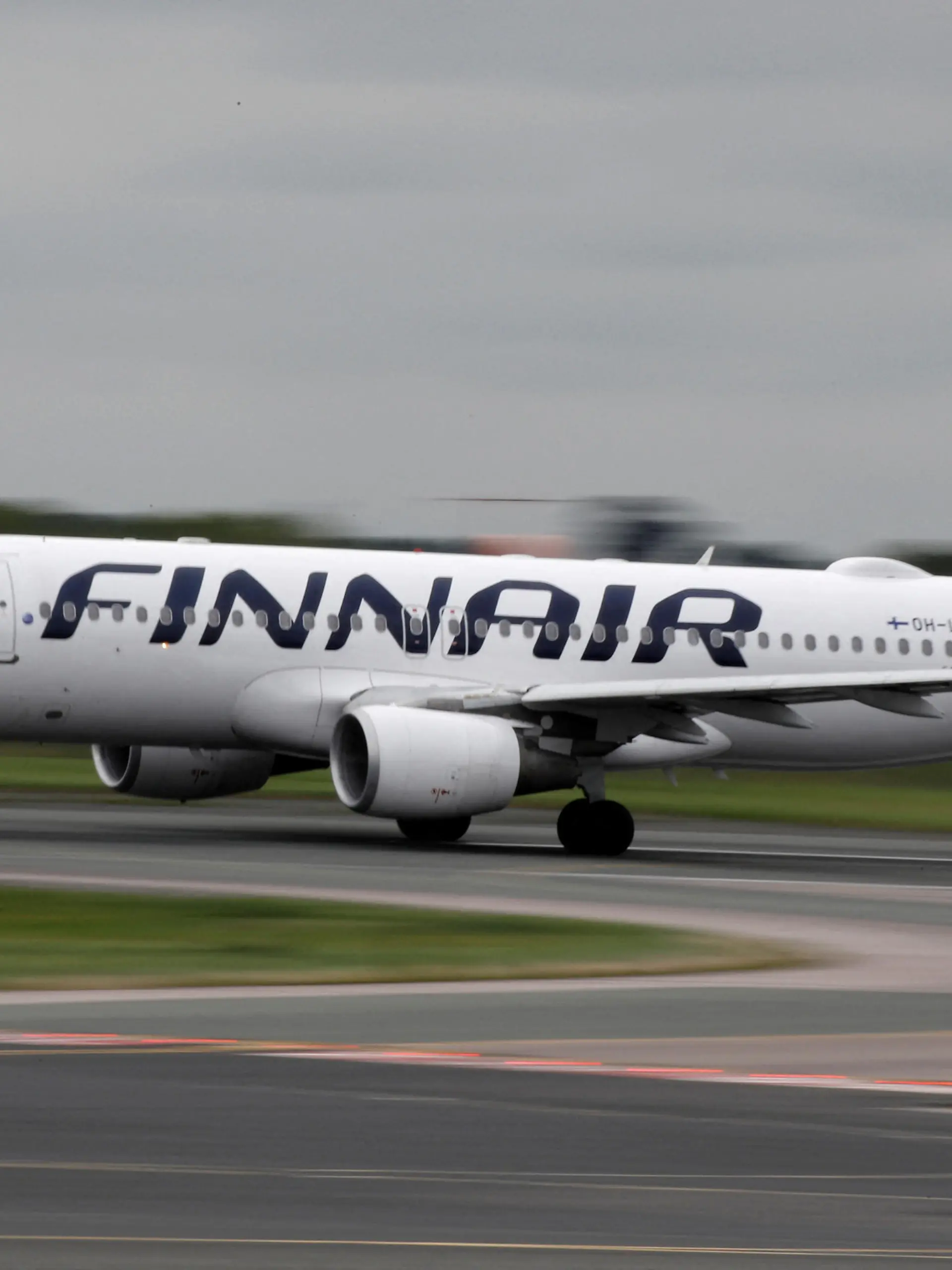 FILE PHOTO: A Finnair Airbus A320-200 aircraft prepares to take off from Manchester Airport in Manchester, Britain September 4, 2018. REUTERS/Phil Noble/File Photo