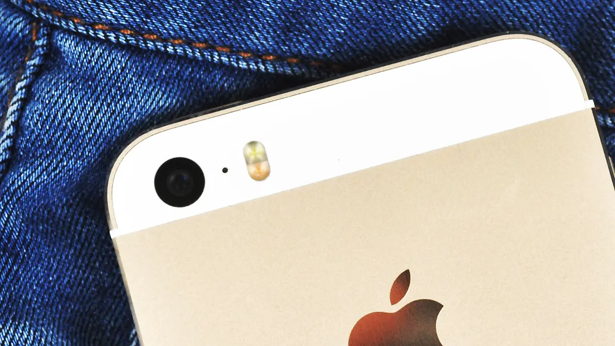 CHLUMCANY, CZECH REPUBLIC, MARCH 10, 2015: Apple iPhone 5s in a denim pocket