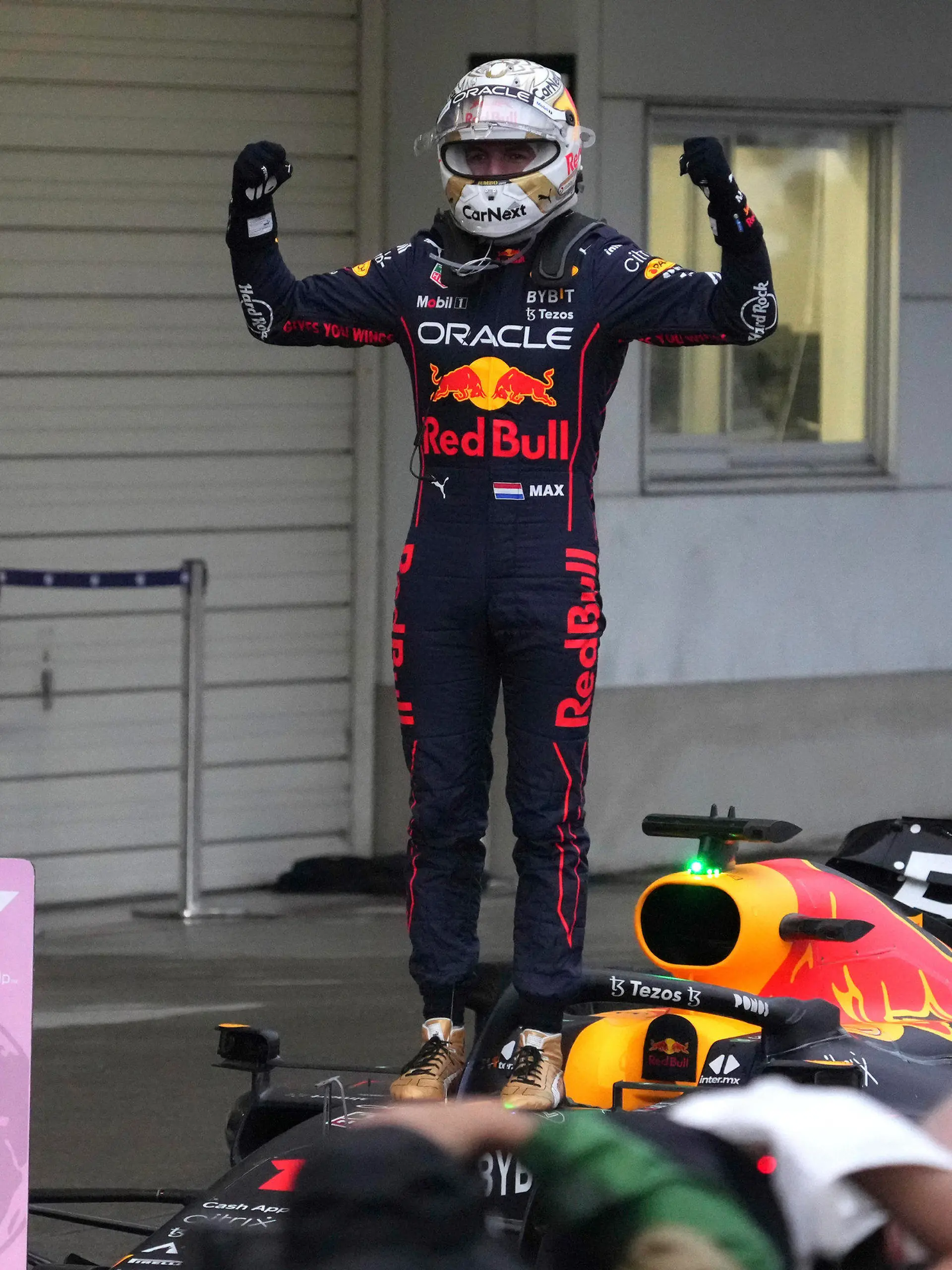 Red Bull driver Max Verstappen of the Netherlands celebrates after winning the Japanese Formula One Grand Prix at the Suzuka Circuit in Suzuka, central Japan, Sunday, Oct. 9, 2022. Verstappen secured second consecutive Formula One drivers' championship. (AP Photo/Toru Hanai)