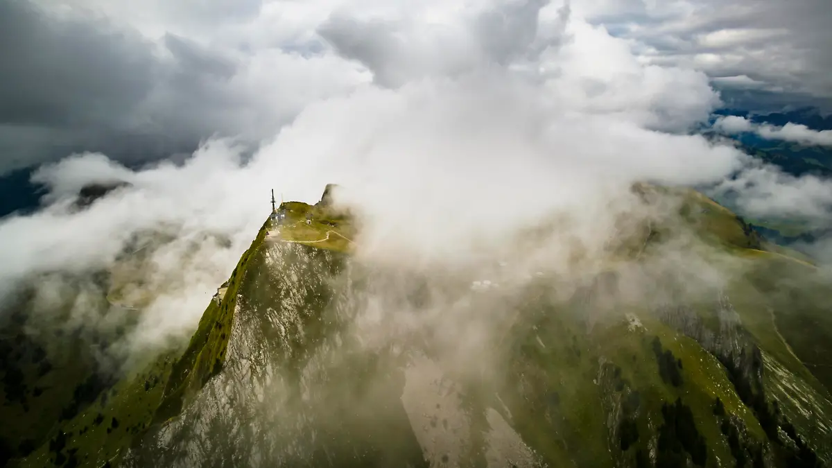 A telecommunication antenna is pictured through the clouds in Les Rochers-de-Naye, in Veytaux above Montreux, Switzerland, Sunday September 10, 2017. 2017 marks the 125th birthday of the Glion to Rochers-de-Naye train line that provides convenient access to the peak culminating at over 2000m above lake Geneva. (KEYSTONE/Valentin Flauraud)