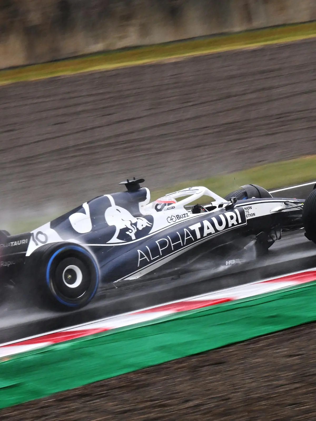 SUZUKA, JAPAN - OCTOBER 09: Pierre Gasly of France driving the (10) Scuderia AlphaTauri AT03 on track during the F1 Grand Prix of Japan at Suzuka International Racing Course on October 09, 2022 in Suzuka, Japan. (Photo by Clive Mason/Getty Images)