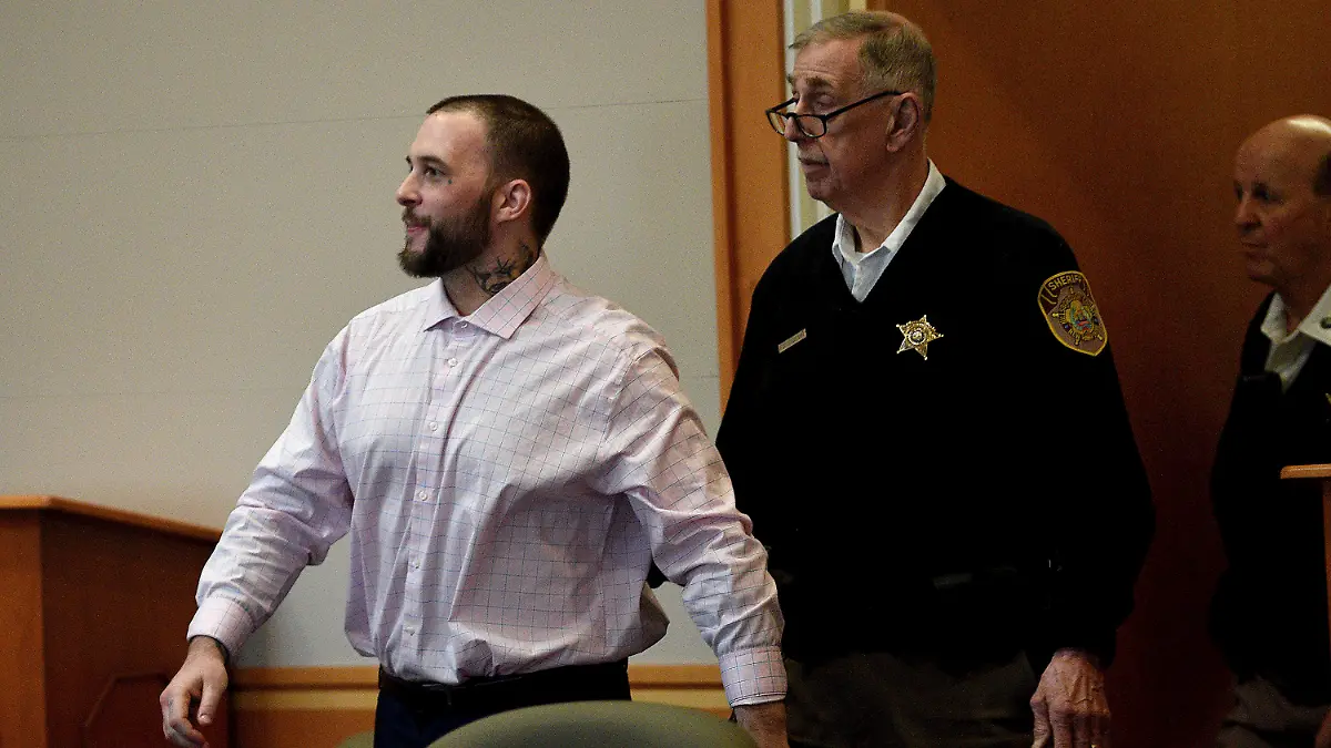 Adam Montgomery enters the courtroom for jury selection ahead of his murder trial at Hillsborough County Superior Court in Manchester, N.H, on Tuesday, Feb. 6, 2024. Montgomery is accused of killing his 5-year-old daughter and spending months moving her body before disposing of it.  (David Lane/Union Leader via AP, Pool)