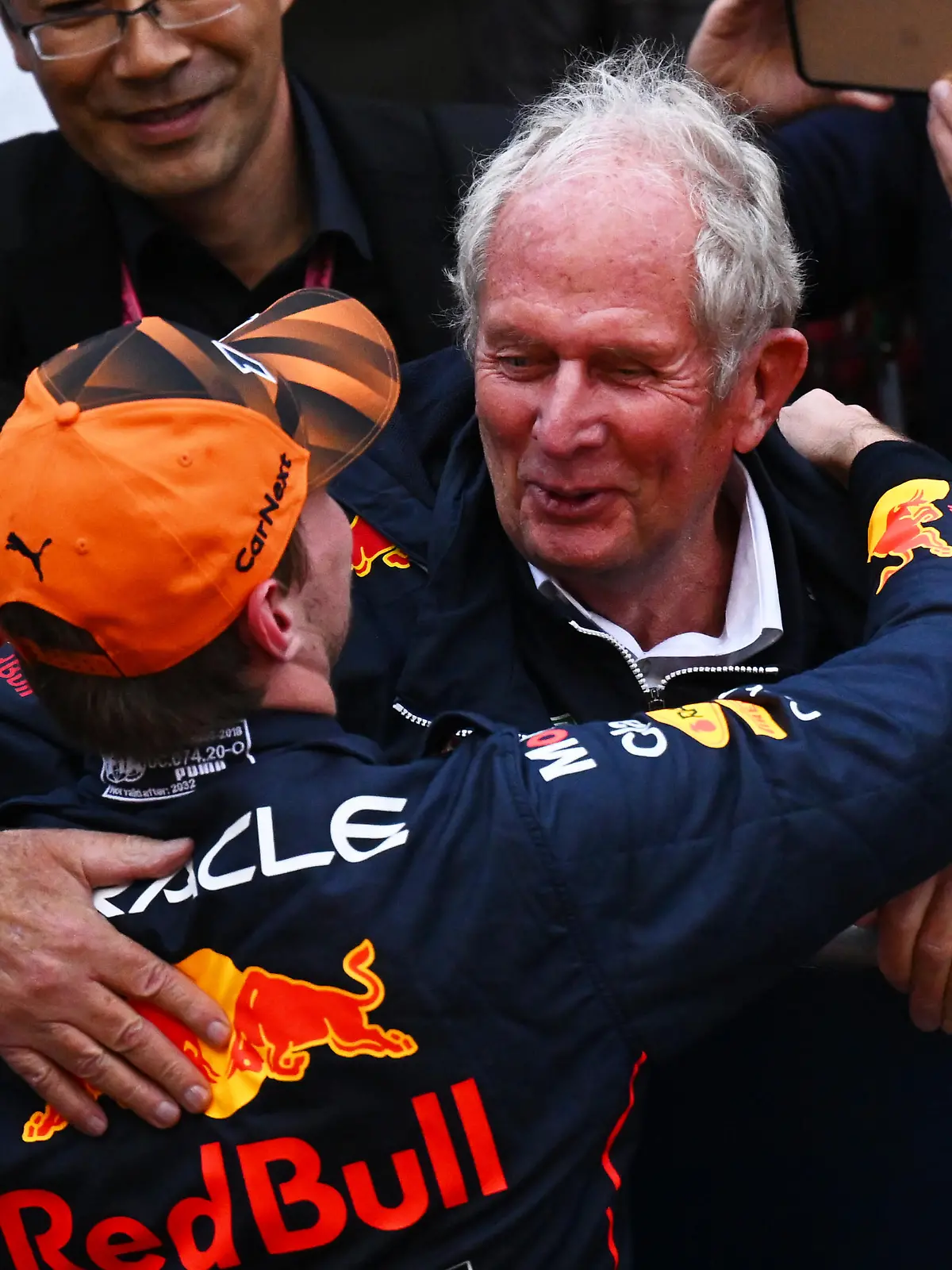 SUZUKA, JAPAN - OCTOBER 09: Race winner and 2022 F1 World Drivers Champion Max Verstappen of Netherlands and Oracle Red Bull Racing celebrates with Red Bull Racing Team Consultant Dr Helmut Marko in parc ferme during the F1 Grand Prix of Japan at Suzuka International Racing Course on October 09, 2022 in Suzuka, Japan. (Photo by Clive Mason/Getty Images)