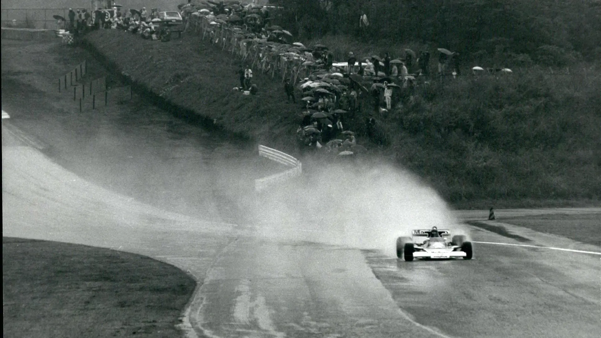 Oct. 10, 1976 - Andretti wins japan GP, but Hunt wins world racing title: Despite suicidal weather James Hunt of Britain clinched the world racing drivers championship at the Fuji speedway in Colombo, as he drove his Melaren into third place in the Japan formula one race won by Mario Andretti of U.S.A in a Lotus. Niki Lauda of Austria the defending champion dropped out of the race after the second Lap, Saying the speedway was too dangerous owing to rain and fog. and he could not see. The cars competing finished the 73 laps as dusk was falling. James Hunt of Britain in his Mclaren leads the field as his speeding car sends up clouds of spray from the rain soaked speedway, despite the rain 72,000 turned out to see the race. PUBLICATIONxINxGERxONLY - ZUMAk09
OCT 10 1976 Andretti Wins Japan GP but Hunt Wins World Racing Title despite Suicidal Weather James Hunt of Britain clinched The World Racing Drivers Championship AT The Fuji Speedway in Colombo As he Drove His into Third Place in The Japan Formula One Race Won by Mario Andretti of U S a in a Lotus Niki Lauda of Austria The Defending Champion dropped out of The Race After The Second Lap saying The Speedway what Too Dangerous Owing to Rain and Fog and he Could Not Lake The Cars competing finished The 73 laps As Dusk what Falling James Hunt of Britain in His McLaren leads The Field As His Speeding Car sends up Clouds of Spray from The Rain soaked Speedway despite The Rain 72 000 turned out to Lake The Race PUBLICATIONxINxGERxONLY ZUMAk09