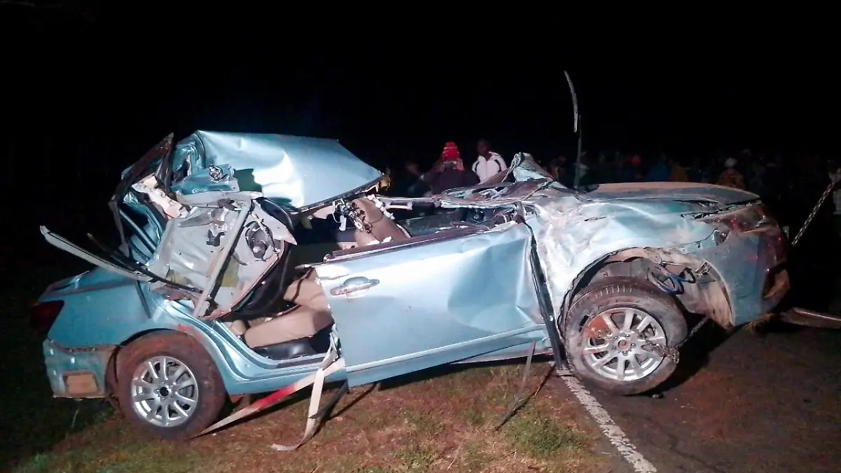 The wreckage of the vehicle in which Kenya's marathon world record holder Kelvin Kiptum and his coach were killed is towed from the scene of the traffic accident along the Kaptagat-to-Eldoret highway, near the Rift Valley town of Eldoret, Kenya February 12, 2024. REUTERS/Stringer REFILE - QUALITY REPEAT
