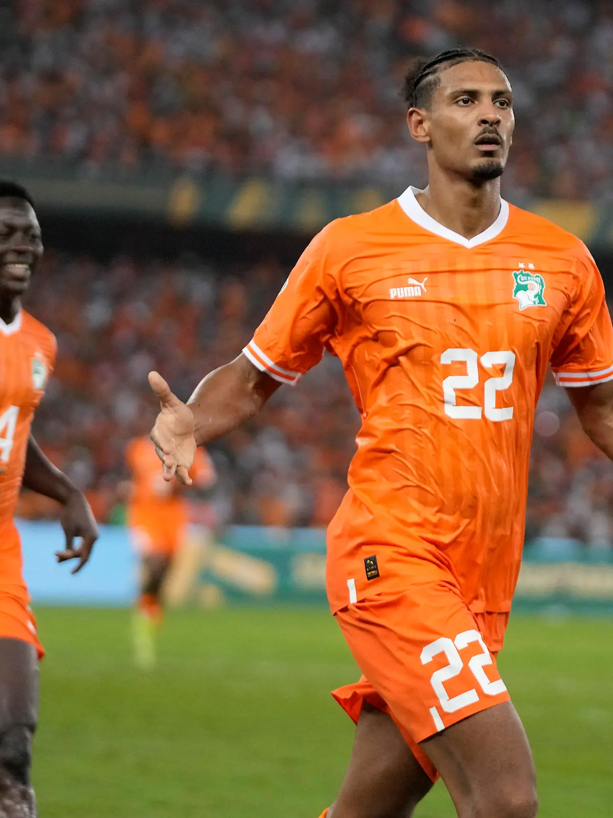 Ivory Coast 's Sebastien Haller celebrates after scoring his side's second goal during the African Cup of Nations final soccer match between Ivory Coast and Nigeria, at the Olympic Stadium of Ebimpe in Abidjan, Ivory Coast, Sunday, Feb. 11, 2024. (AP Photo/Themba Hadebe)