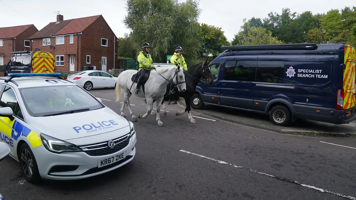 Gateshead incident. Mounted police patrol the scene on Aycliffe Crescent, Gateshead, where a 14-year-old boy was fatally attacked. Picture date: Tuesday October 4, 2022. See PA story POLICE Gateshead. Photo credit should read: Owen Humphreys/PA Wire URN:69128229