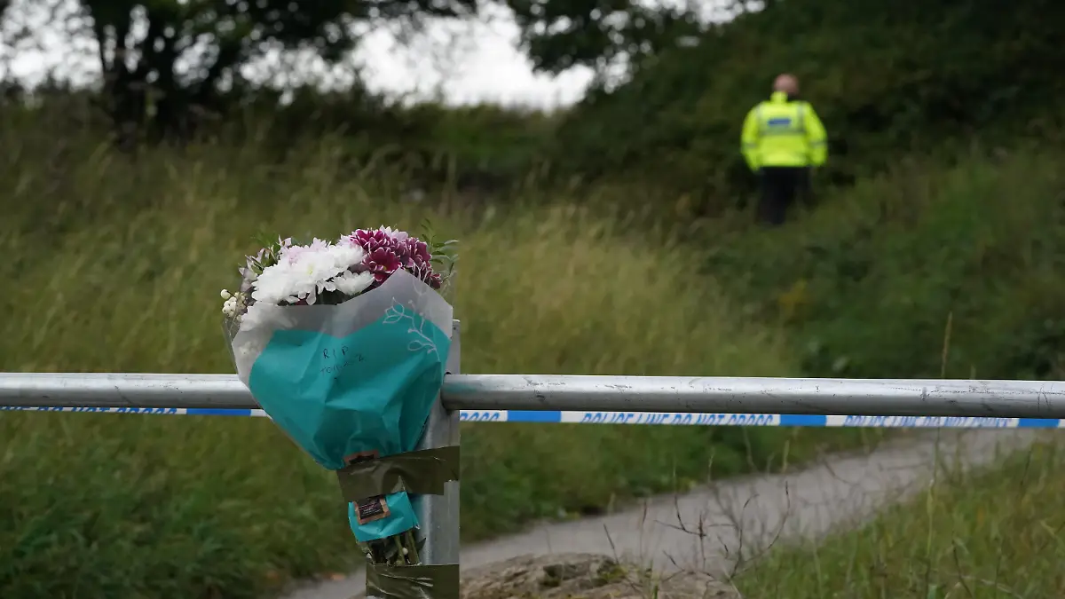 Gateshead incident. A floral tribute left at the scene on Aycliffe Crescent, Gateshead, where a 14-year-old boy was fatally attacked. Picture date: Tuesday October 4, 2022. See PA story POLICE Gateshead. Photo credit should read: Owen Humphreys/PA Wire URN:69128165