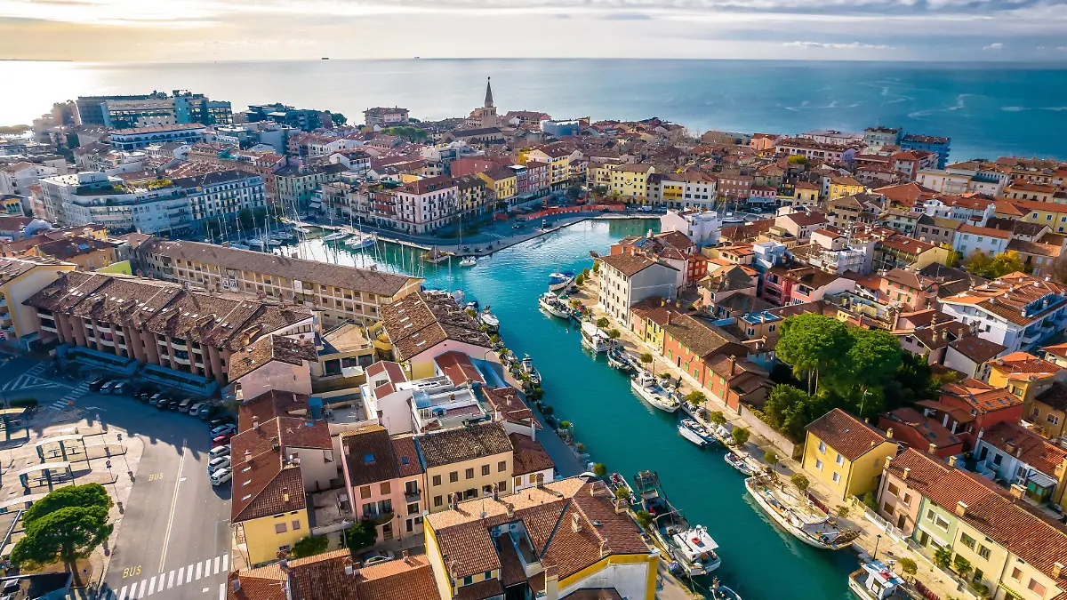 Town of Grado colorful architecture and channels aerial view, Friuli-Venezia Giulia region of Italy