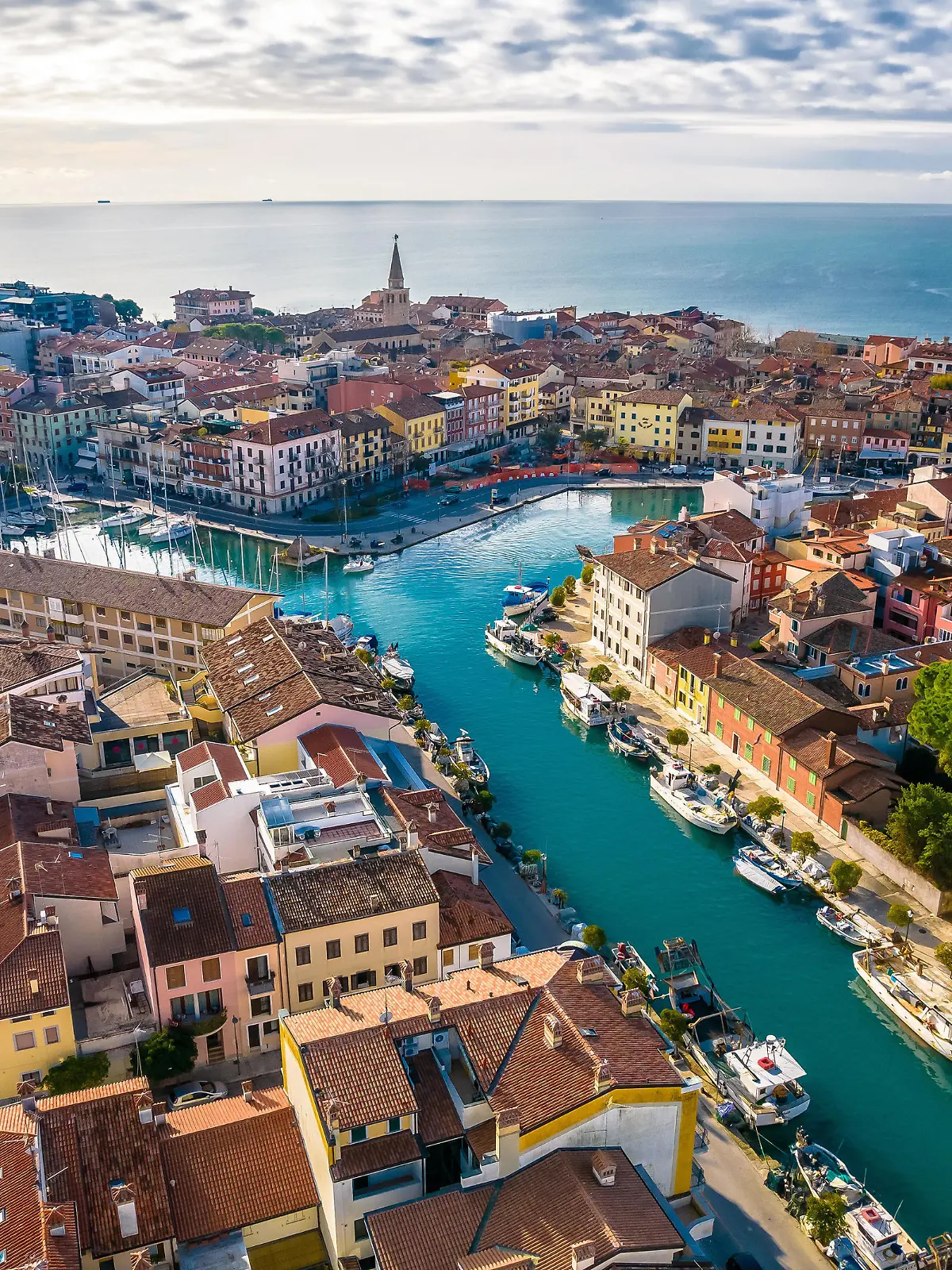 Town of Grado colorful architecture and channels aerial view, Friuli-Venezia Giulia region of Italy