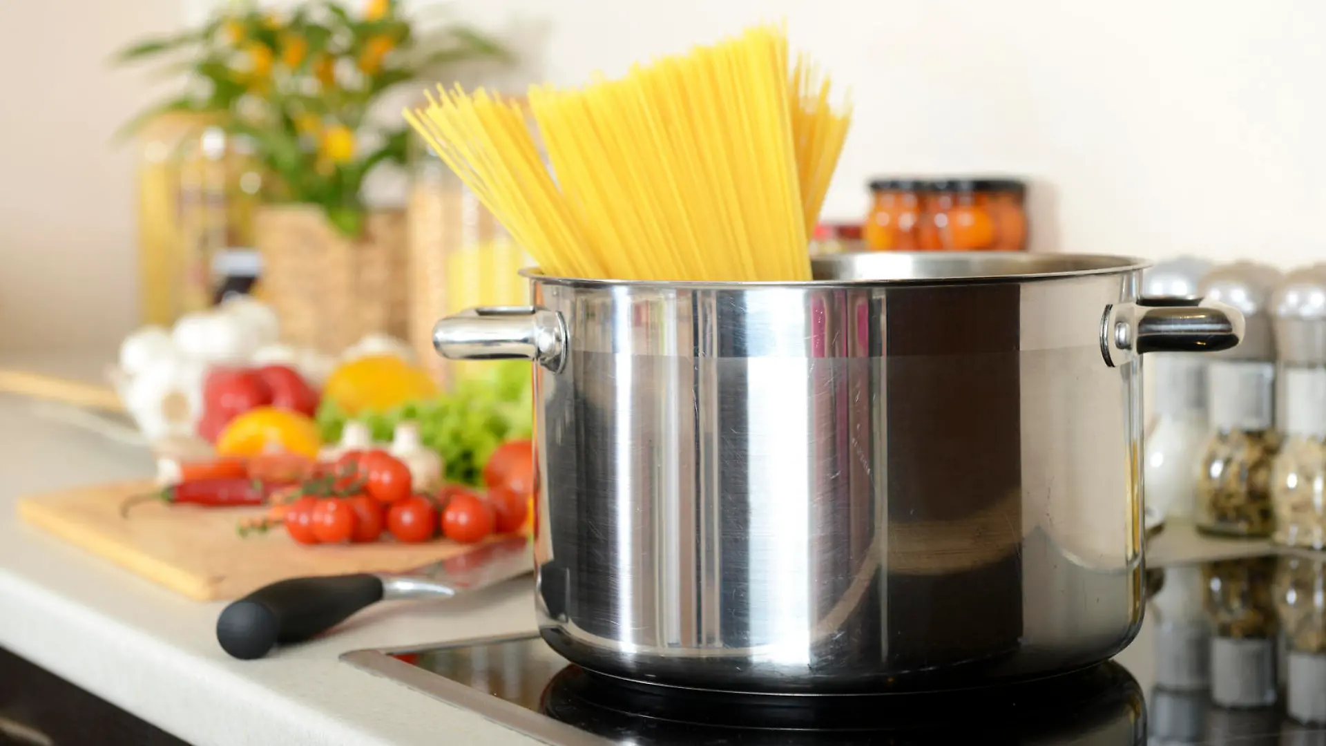 spaghetti in a pan on the stove