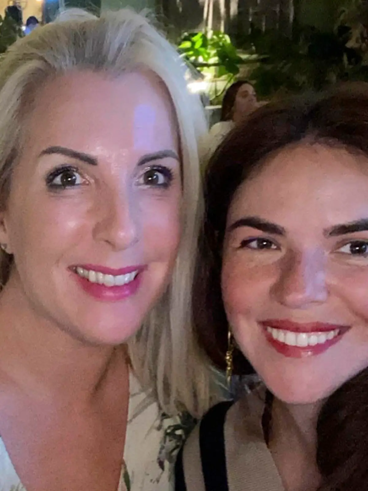 This undated image provided by Sanna Rameau, shows Ana Maria Knezevic, right, and Rameau. Spanish police are searching for Knezevic, a Colombian-American woman who went missing suddenly in Madrid. (Sanna Rameau via AP)