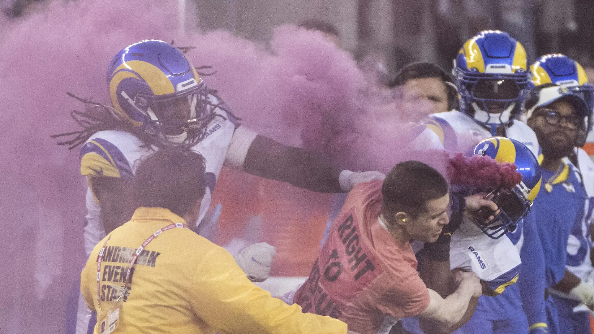 Los Angeles Rams linebacker Bobby Wagner R takes out a man with a smoke bomb who ran on the field in the second quarter of Monday Night Football featuring the San Francisco 49ers against the Los Angeles Rams at Levi s Stadium in Santa Clara, California on Monday, October 3, 2022. The 49ers defeated the Rams 24-9. PUBLICATIONxINxGERxSUIxAUTxHUNxONLY SXP2022100327 TERRYxSCHMITT