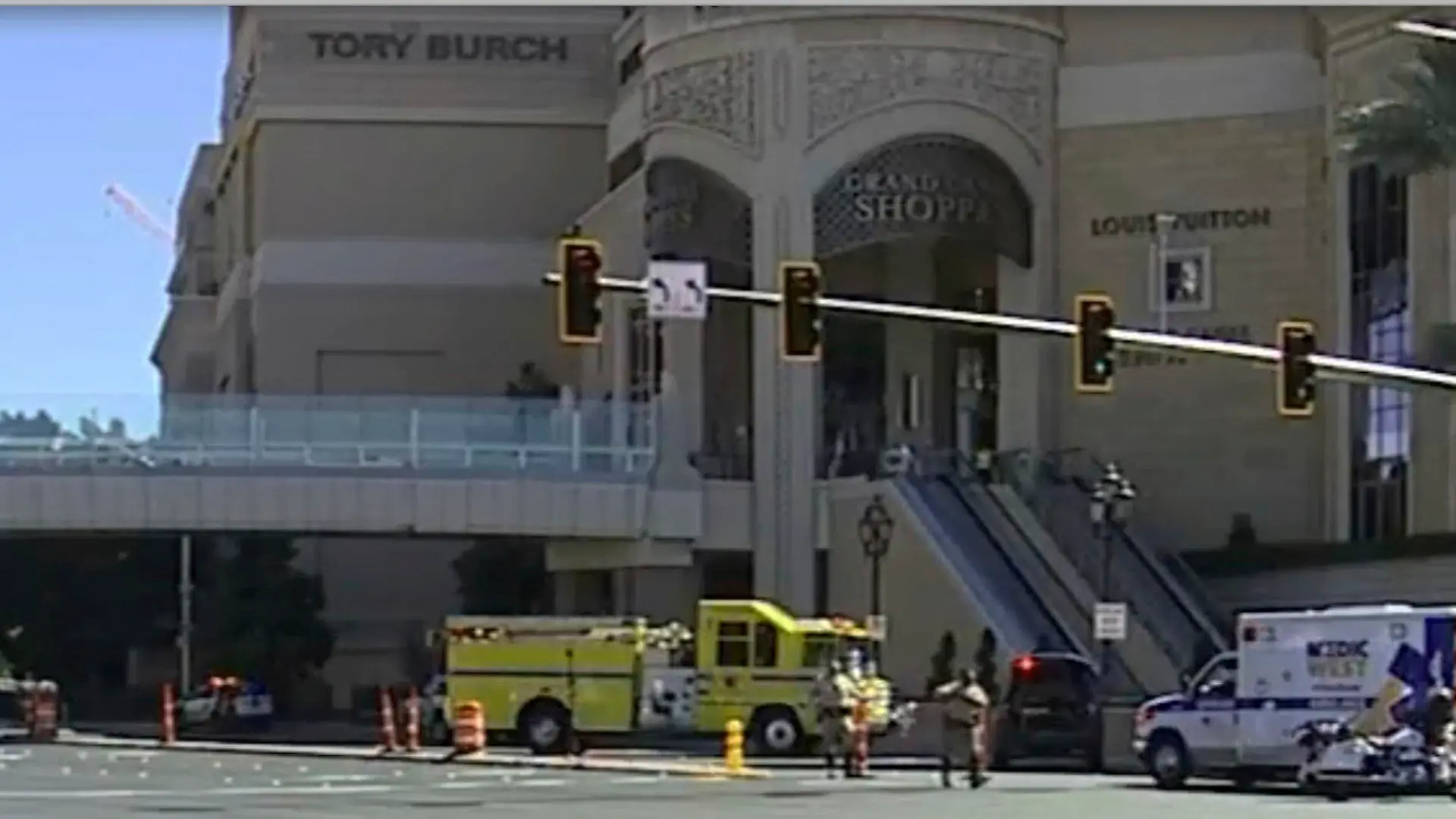 Emergency personnel respond the scene of a stabbing along the Las Vegas Strip on Thursday, Oct. 6, 2022.  Police say one person has been fatally stabbed and at least five others wounded.  A suspect is in custody.   (KTNV via AP)
