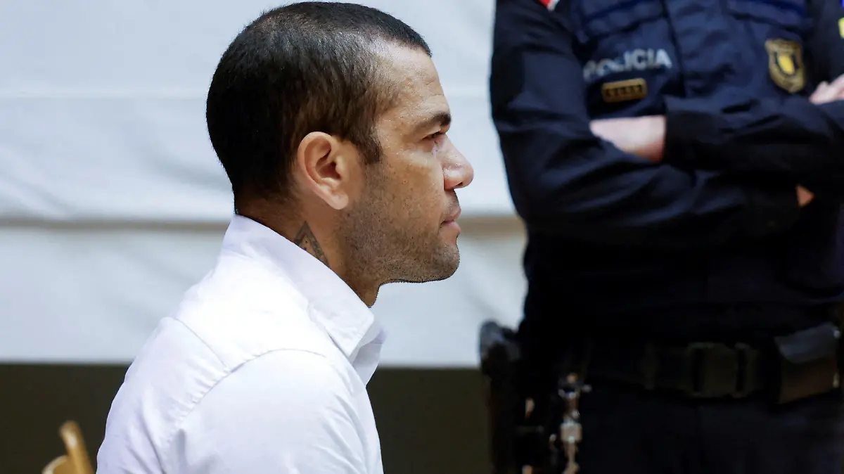 FILE PHOTO: Brazil soccer player Dani Alves sits in court during the first day of his trial in Barcelona, Spain, February 5, 2024. Alberto Estevez/Pool via REUTERS/File Photo
