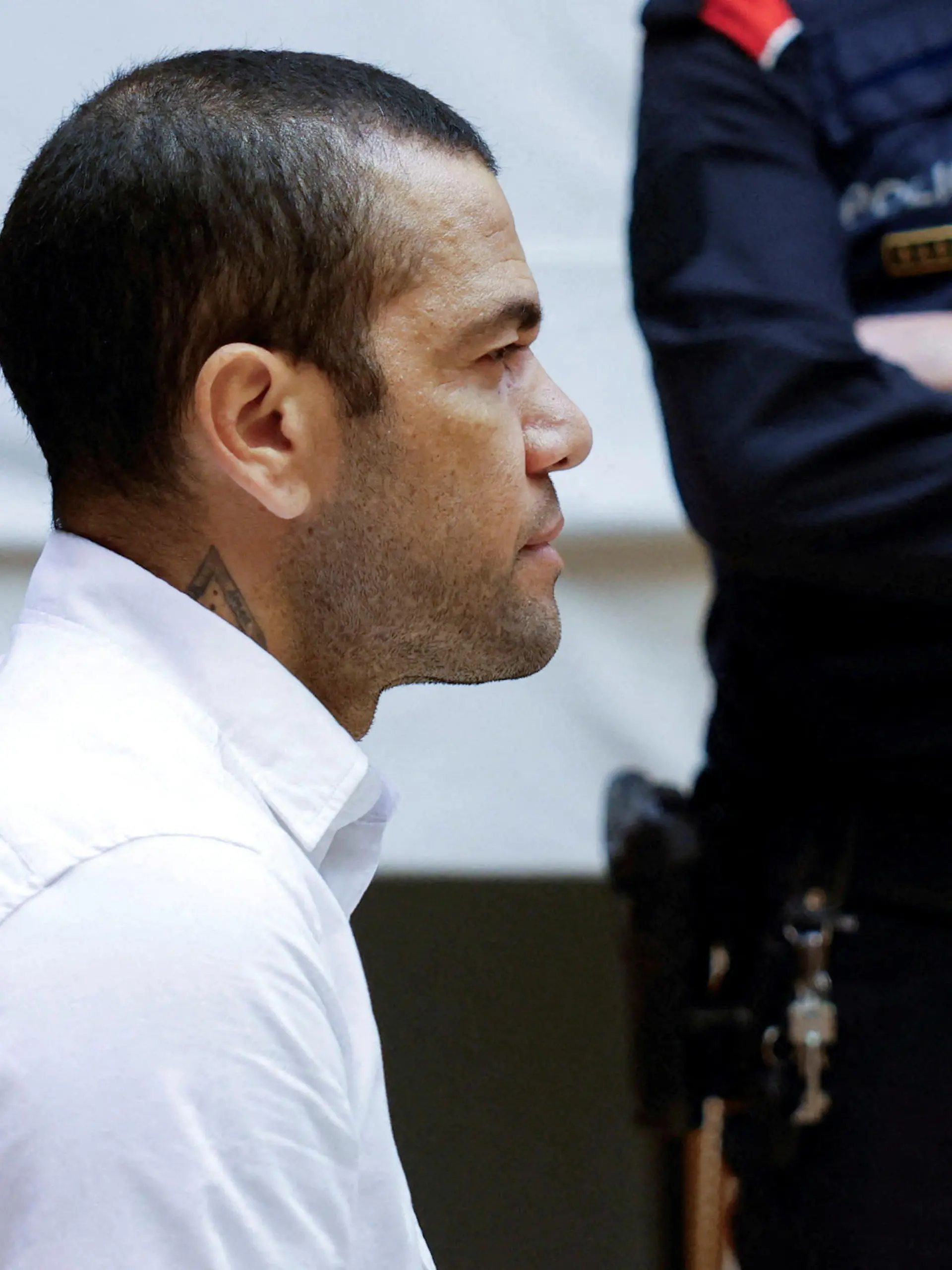 FILE PHOTO: Brazil soccer player Dani Alves sits in court during the first day of his trial in Barcelona, Spain, February 5, 2024. Alberto Estevez/Pool via REUTERS/File Photo