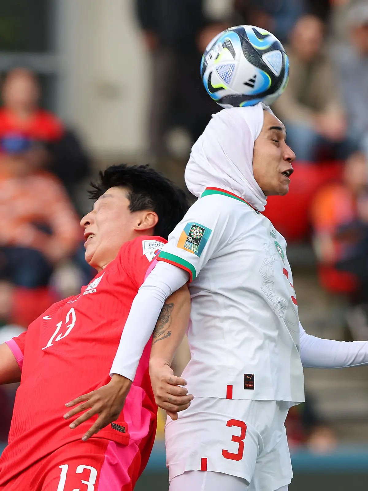 ADELAIDE, AUSTRALIA - JULY 30: Nouhaila Benzina of Morocco and Park Eunsun of Korea Republic compete for the ball during the FIFA Women's World Cup Australia & New Zealand 2023 Group H match between Korea Republic and Morocco at Hindmarsh Stadium on July 30, 2023 in Adelaide, Australia. (Photo by Sarah Reed/Getty Images) *** BESTPIX ***