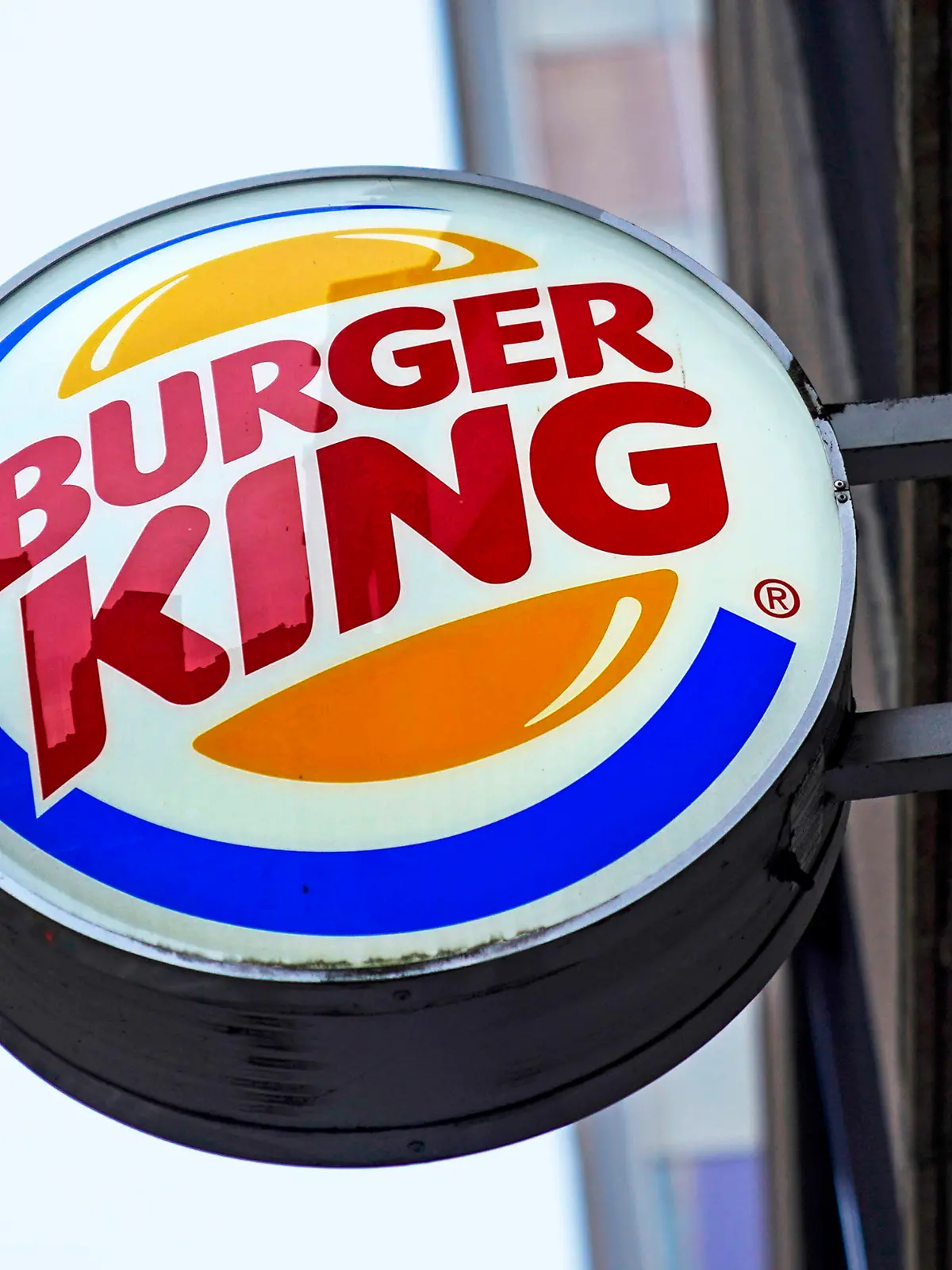 FILE - The Burger King logo is displayed on a sign outside a restaurant in downtown Pittsburgh on Wednesday, Jan. 12, 2022. On Friday, Sept. 9, 2022, the company said it plans to invest $400 million in its U.S. restaurants over the next two years to update its stores and boost flagging sales. (AP Photo/Gene J. Puskar, File)