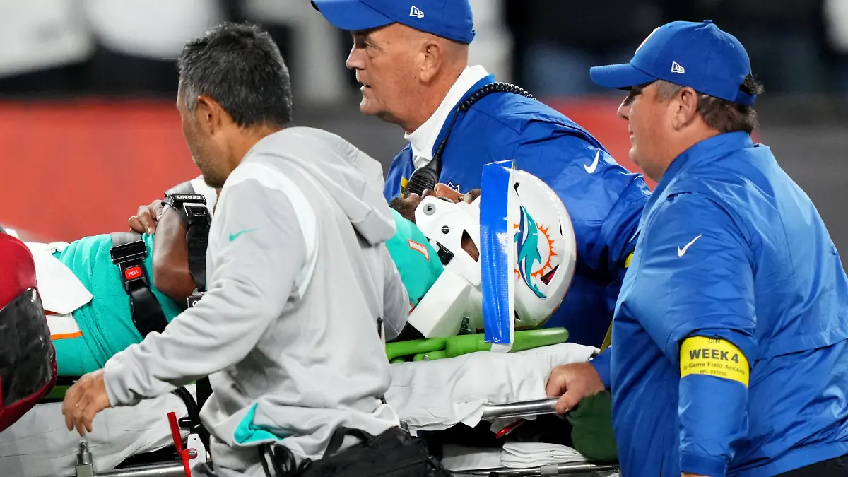 Sep 29, 2022; Cincinnati, Ohio, USA; Miami Dolphins quarterback Tua Tagovailoa (1) is taken off the field after suffering a head injury following a sack by Cincinnati Bengals defensive tackle Josh Tupou (not pictured) in the second quarter at Paycor Stadium in Cincinnati. Mandatory Credit: Kareem Elgazzar-USA TODAY Sports