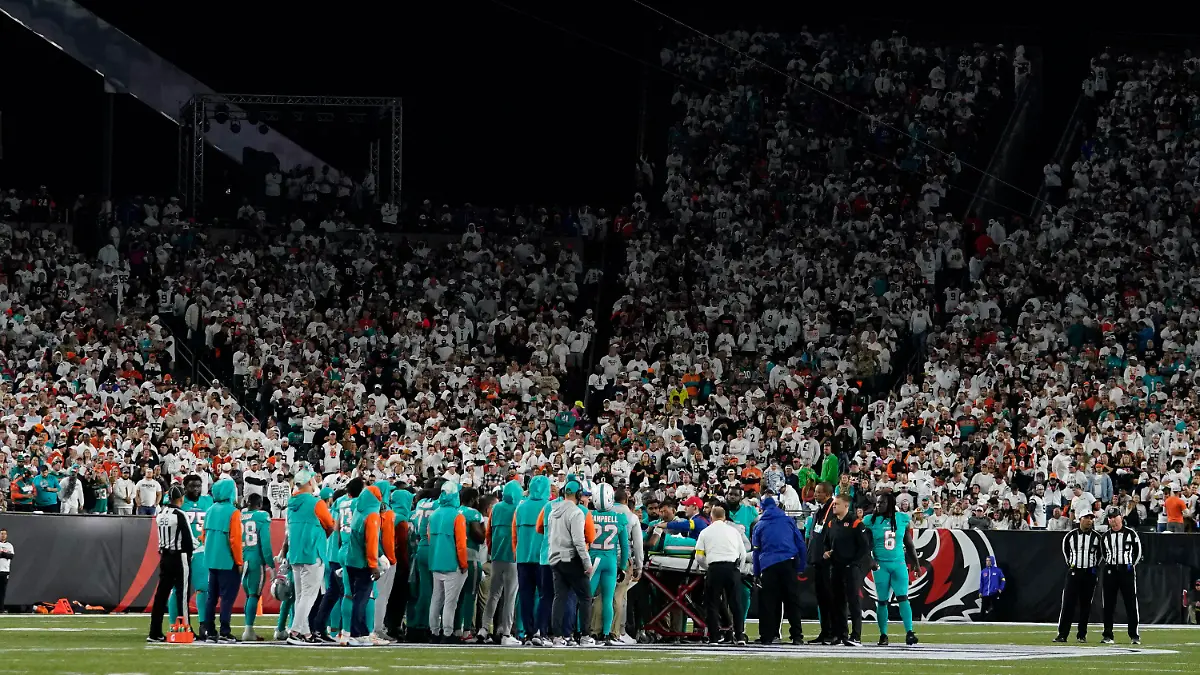 Miami Dolphins quarterback Tua Tagovailoa is taken off the field on a stretcher during the first half of an NFL football game against the Cincinnati Bengals, Thursday, Sept. 29, 2022, in Cincinnati. (AP Photo/Jeff Dean)