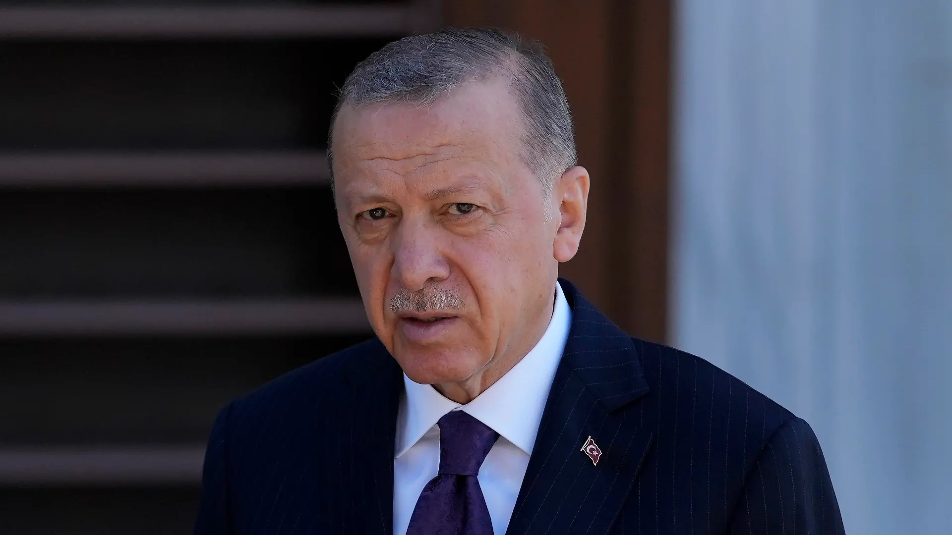 Turkish President Recep Tayyip Erdogan speaks to the media following the Friday noon Prayer in Istanbul, Turkey, Friday, Sept. 9, 2022. Erdogan said he would like to attend the funeral of Queen Elizabeth providing his schedule permits it. Erdogan told reporters Friday that he knew the queen and had met her at Buckingham Palace twice. "If we find the opportunity we would like to be present at this ceremony," he said. Queen Elizabeth II, Britain's longest-reigning monarch, died Thursday after 70 years on the throne. She was 96. (AP Photo/Khalil Hamra)