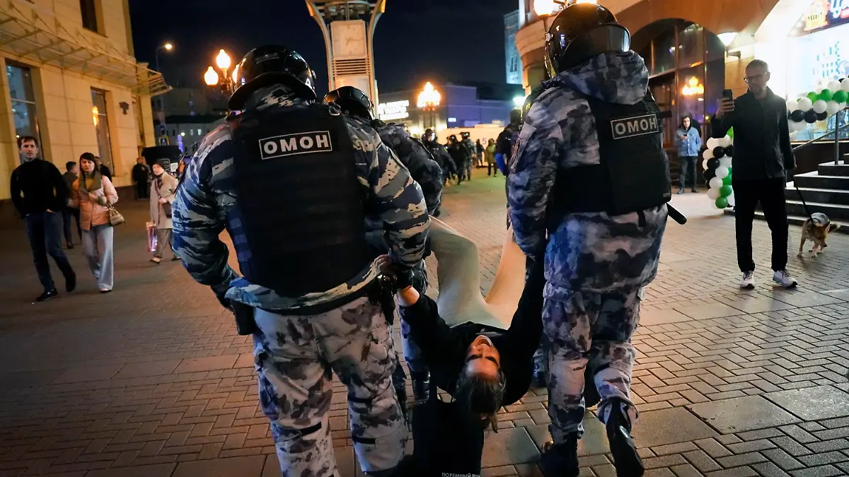 FILE Riot police detain a demonstrator during a protest against mobilization in Moscow, Russia, Wednesday, Sept. 21, 2022. Russian President Vladimir Putin has ordered a partial mobilization of reservists in Russia, effective immediately. (AP Photo, File)