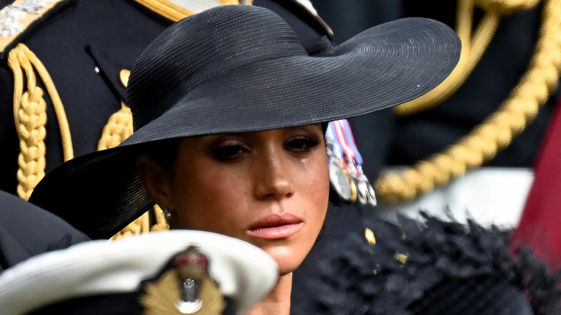 Britain's Meghan, Duchess of Sussex, reacts as she attends the state funeral and burial of Britain's Queen Elizabeth, in London, Britain, September 19, 2022 REUTERS/Toby Melville TPX IMAGES OF THE DAY