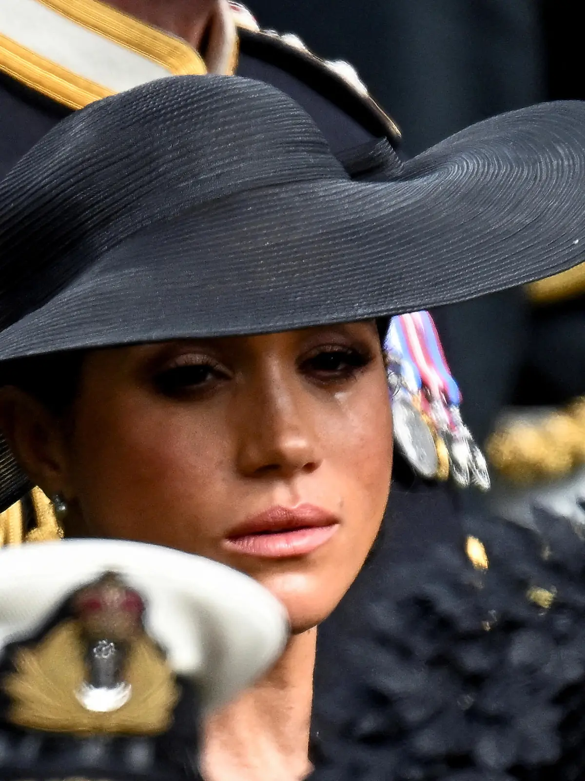 Britain's Meghan, Duchess of Sussex, reacts as she attends the state funeral and burial of Britain's Queen Elizabeth, in London, Britain, September 19, 2022 REUTERS/Toby Melville      TPX IMAGES OF THE DAY