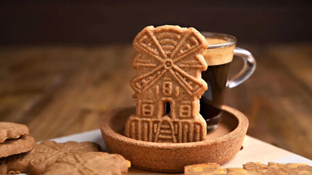 Speculaas koekjes and espresso for st. Nicolas . Dutch holiday Sinterklaas traditional sweets gingerbread cookies. 5th December holiday in the Netherlands.