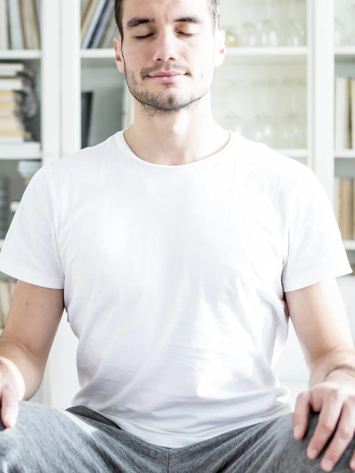 Man meditating at home model released Symbolfoto property released PUBLICATIONxINxGERxSUIxAUTxHUNxONLY WESTF23000  