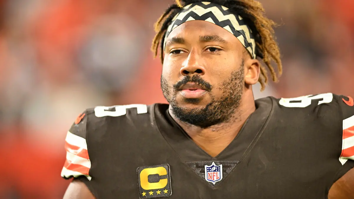 FILE - Cleveland Browns defensive end Myles Garrett (95) walks on the field during an NFL football game against the Pittsburgh Steelers, Sept. 22, 2022, in Cleveland. Garrett was released from a hospital late Monday, Sept. 26, after he was injured when he rolled over his Porsche while driving on a rural road following practice. (AP Photo/David Richard, File)