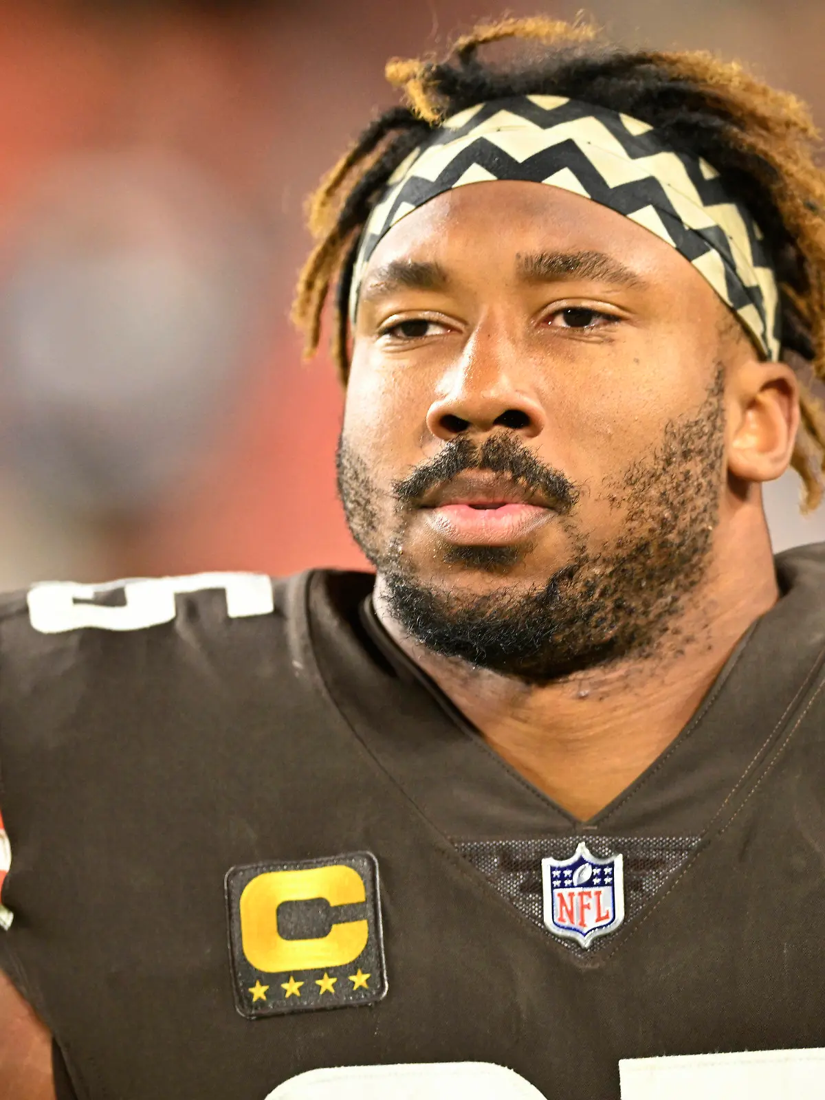 FILE - Cleveland Browns defensive end Myles Garrett (95) walks on the field during an NFL football game against the Pittsburgh Steelers, Sept. 22, 2022, in Cleveland. Garrett was released from a hospital late Monday, Sept. 26, after he was injured when he rolled over his Porsche while driving on a rural road following practice. (AP Photo/David Richard, File)