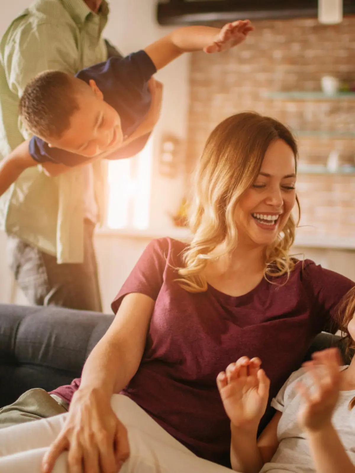 Close up of a happy young family having good time together.