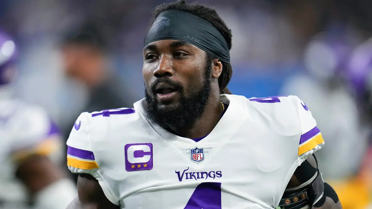 FILE - Minnesota Vikings running back Dalvin Cook (4) runs on the field before an NFL football game against the Detroit Lions in Detroit, on Dec. 11, 2022. The Minnesota Vikings are parting ways with the star running back for salary cap savings after his fourth consecutive season surpassing the 1,000-yard rushing mark. Cook has been informed he will be released, a person familiar with the team’s decision told The Associated Press on Thursday, June 8, 2023. (AP Photo/Paul Sancya, File)