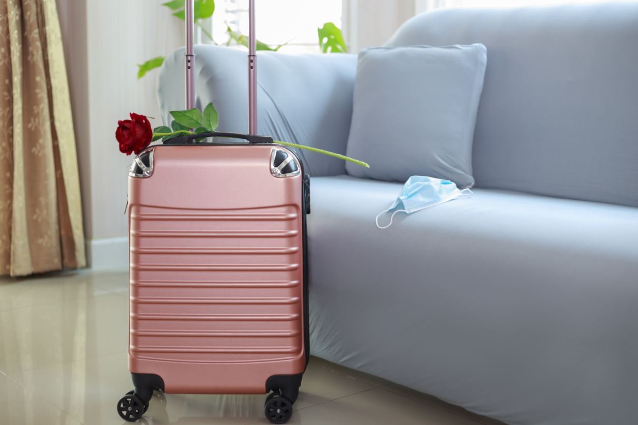 Koffer mit roter Rose