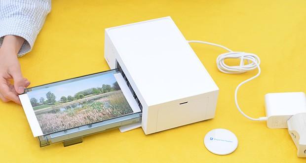 Liene 10X15 WiFi Fotodrucker im Test - der Fotorucker laminiert auch automatisch die Fotos, so dass sie wasserdicht und antioxidativ sind