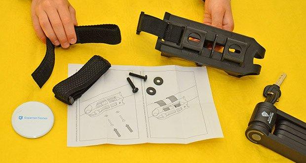 RW-Manufaktur kompaktes Fahrradschloss im Test - die Halterung des Fahrradschlosses mit in der Packung enthaltenen Klebebänder oder Schrauben am Fahrrad befestigen